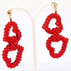 Boucles d'oreilles tissées double cœur corail Méditerranée